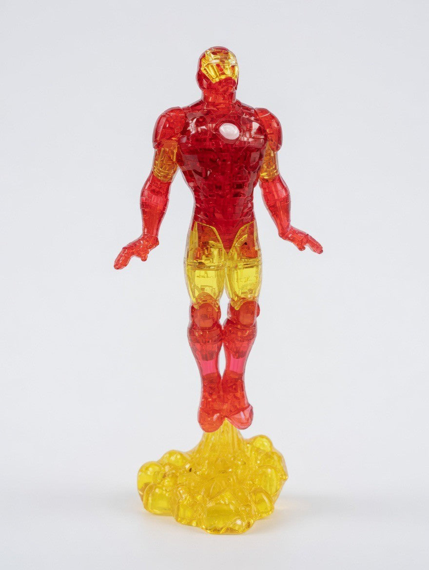 ImagineHaul Marvel Iron Man 3D crystal puzzle figure, translucent red and gold, 37 pieces, on yellow energy blast base.