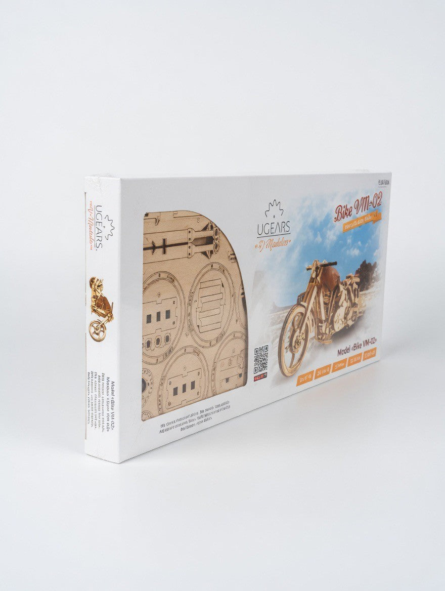 ImagineHaul UGEARS Bike VM-02 mechanical wooden model kit, self-propelled 3D puzzle motorcycle with laser-cut birch plywood pieces.