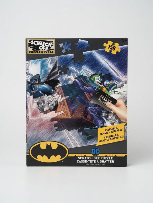 ImagineHaul Batman vs. Joker 150-piece scratch-off puzzle with sketch art of Batman on a motorcycle chasing the Joker, revealing full-color art.