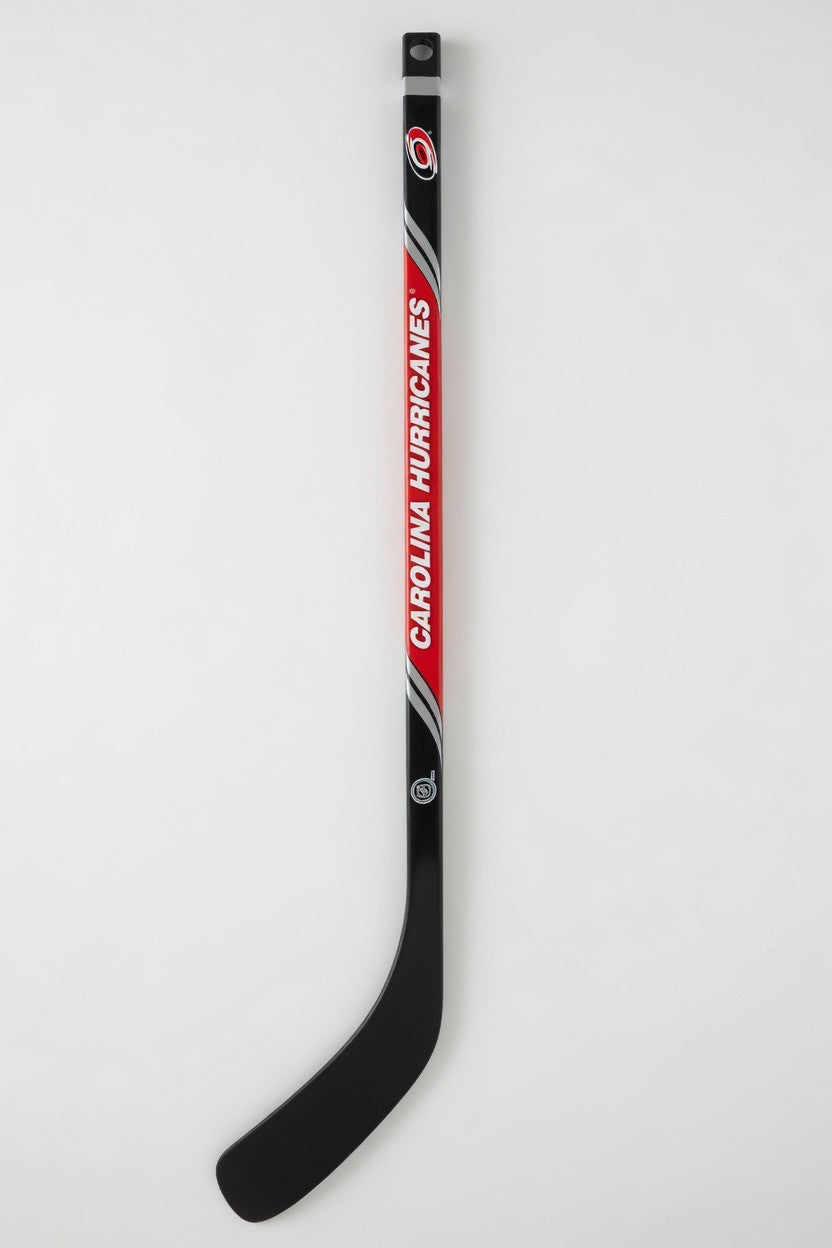 Carolina Hurricanes NHL mini hockey stick with red, black, and silver accents. Composite construction.