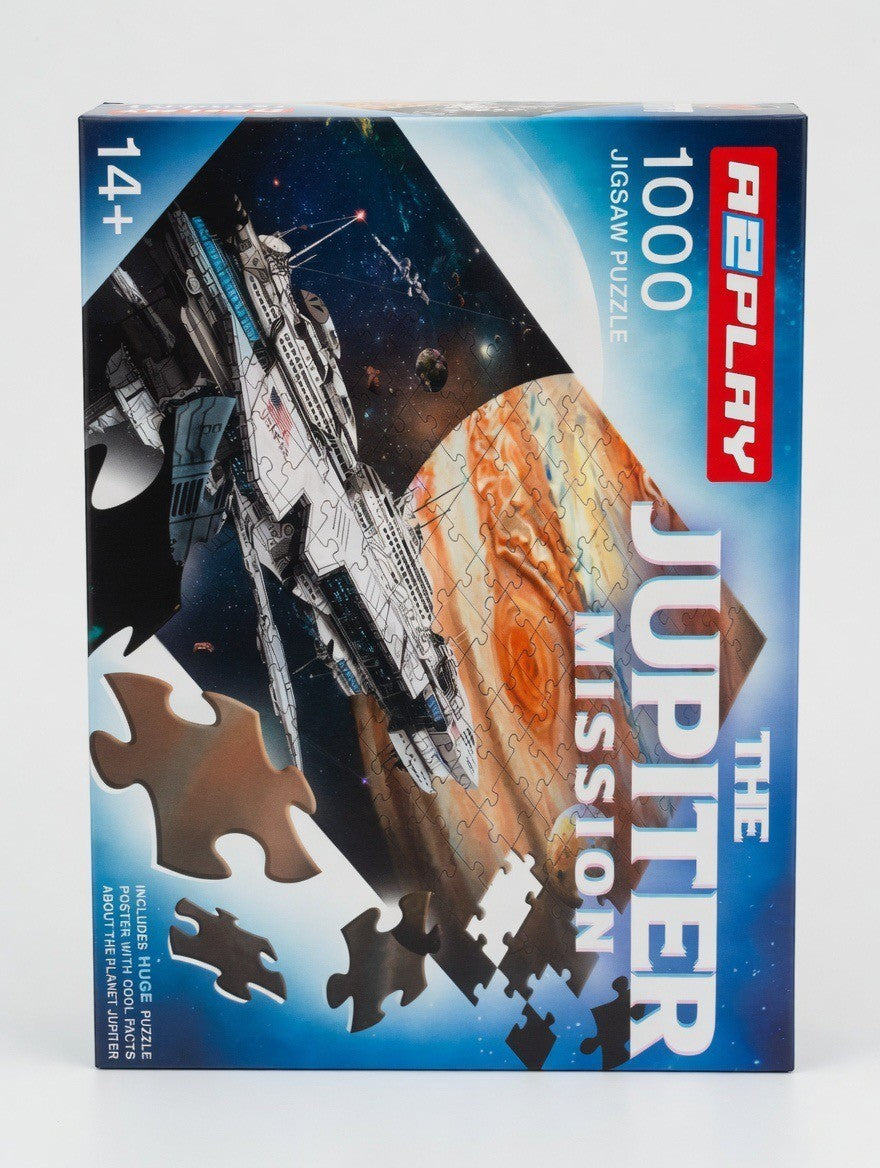 ImagineHaul A2PLAY The Jupiter Mission 1000-piece jigsaw puzzle featuring a futuristic spacecraft approaching Jupiter. Includes bonus poster.