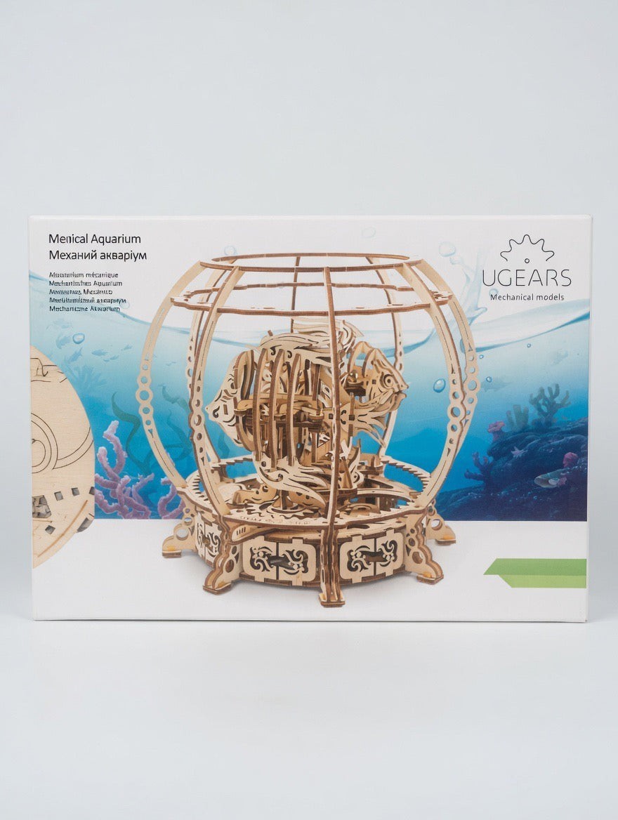 ImagineHaul Mechanical Aquarium wooden model kit with a moving fish inside a 3D puzzle display.