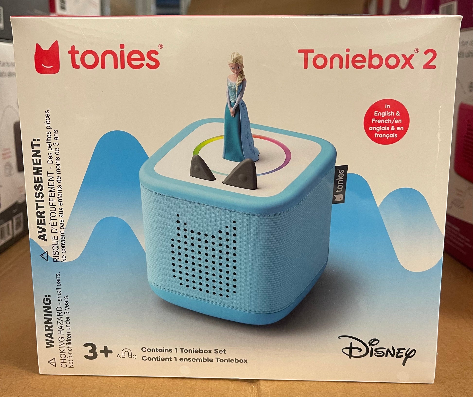 ImagineHaul Toniebox 2 audio player in sky blue with Elsa figure from Disney's Frozen. Screen-free, bilingual audio player for kids 3+.