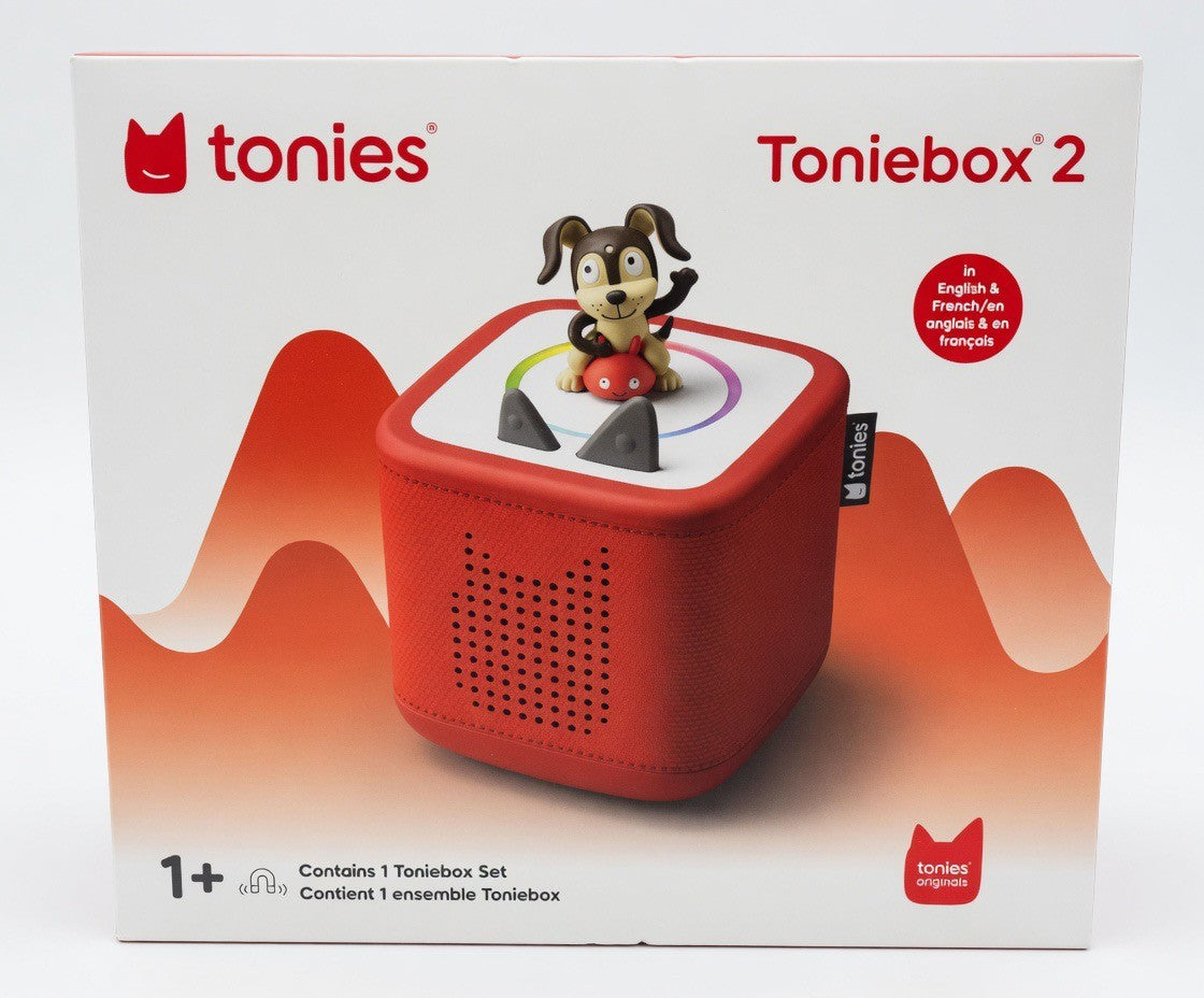 ImagineHaul Toniebox 2 Starter Set in red, a screen-free audio player for kids with a dog Tonie figure. Features bilingual audio and customizable LED colors.