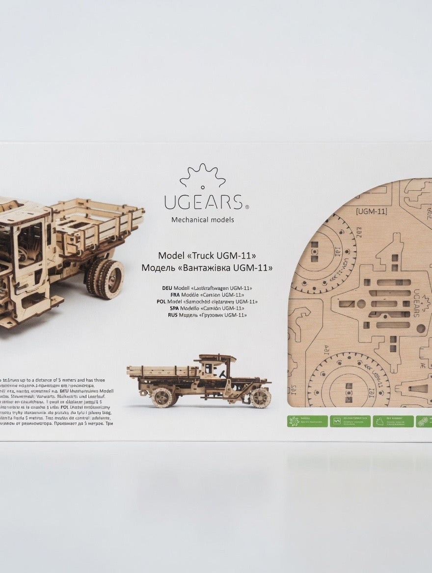 ImagineHaul UGEARS Truck UGM-11 mechanical wooden model kit, a vintage flatbed truck made of birch plywood with intricate gears and wheels.